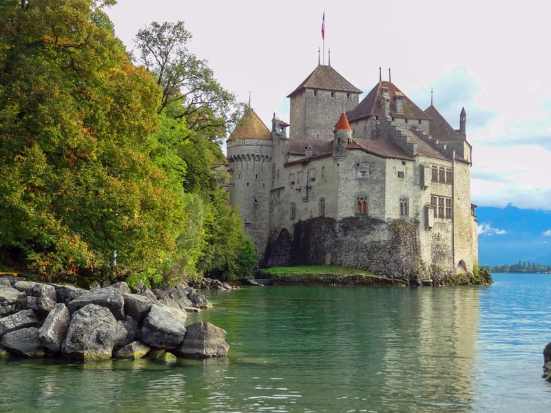 a castle on a lake in Montreux Switzerland