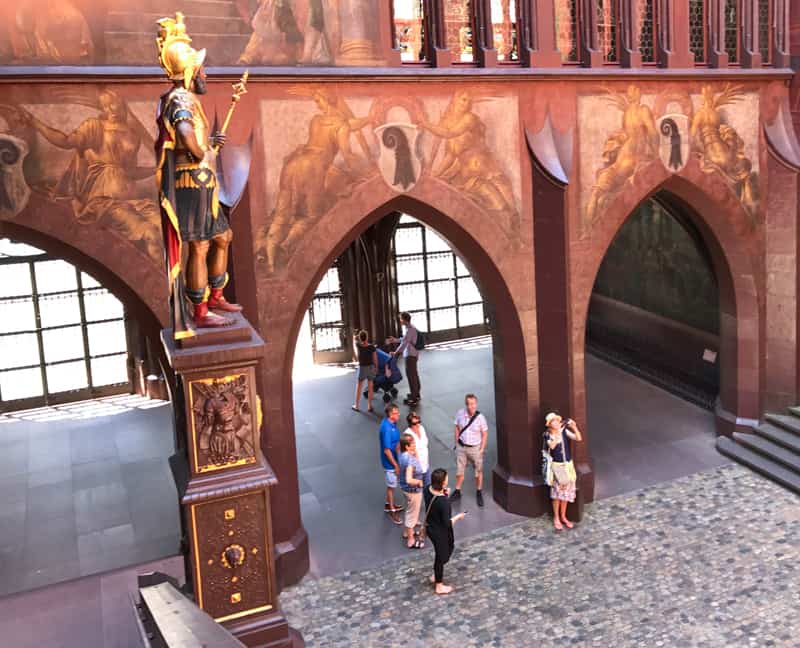 people in the beautiful courtyard of an old building in Basel