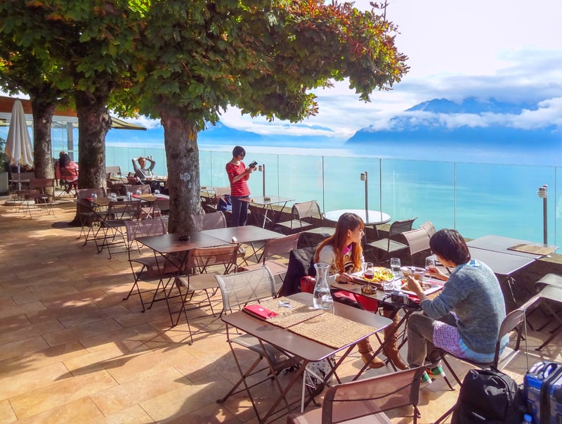 people dining near a lake in Montreux Switzerland