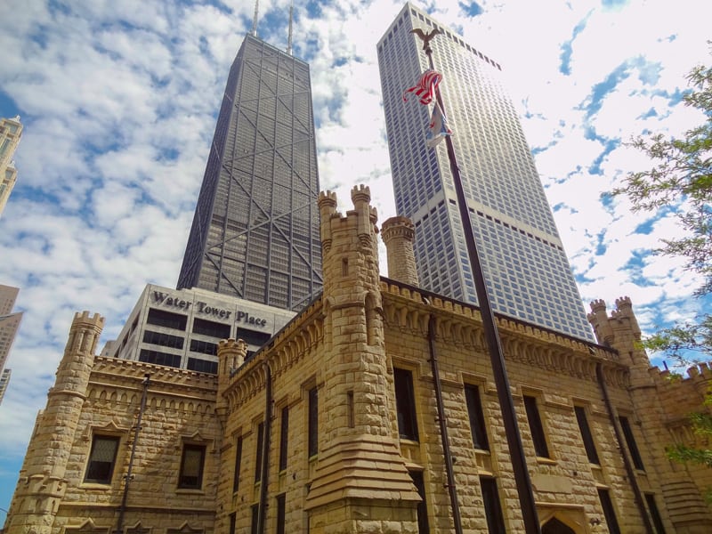 new and old buildings together in a city