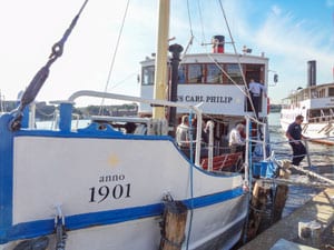 an old steamship in a harbor