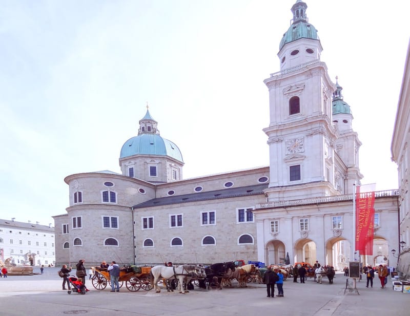 horse-drawn carts and an old building seen on a short tour of beautiful salzburg