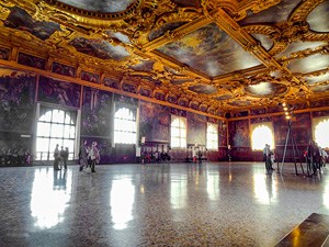 a large room with a very ornate ceiling in one of the best places to visit in Venice