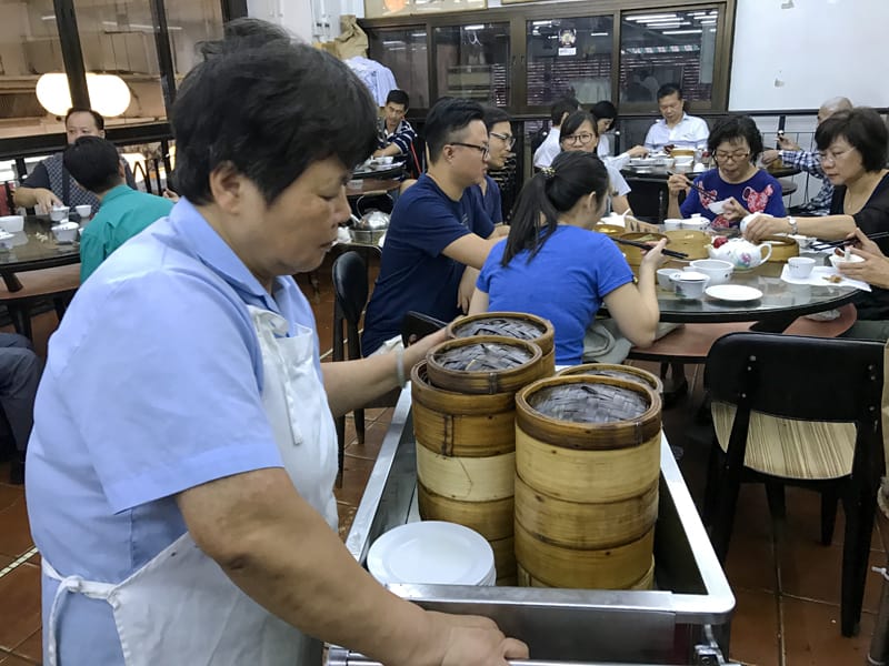 people having the best din sum in the hong kong lin heung tea house