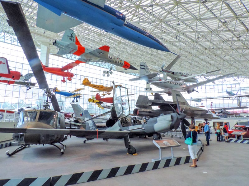 large planes hanging in an airplane museum