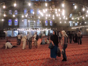 people visiting a mosque, one of the things to do in Istanbul
