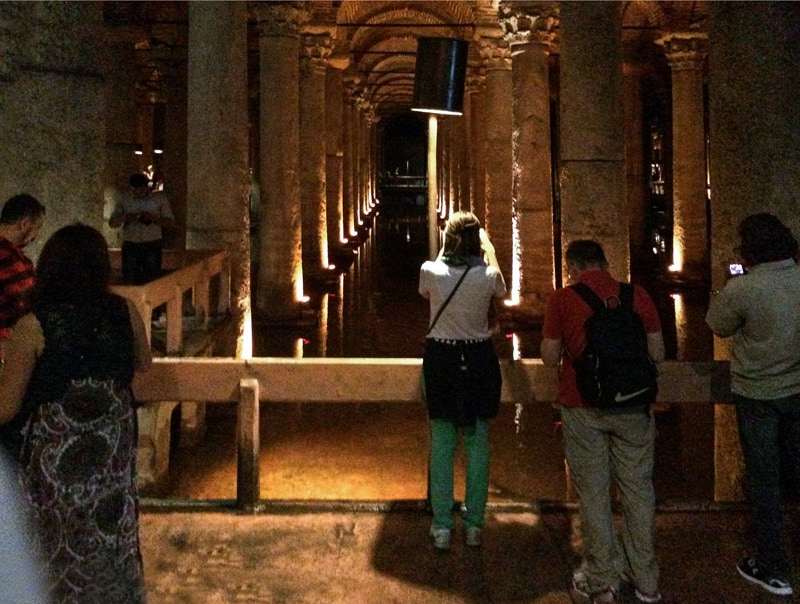 people in an ancient cistern