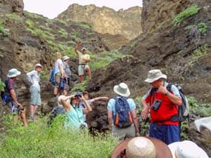 people on a hike on a Galapagos cruise vacation