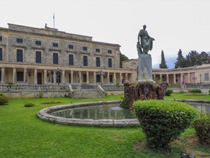 a statue in front of a museum - one of the things to do in Corfu