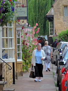 a woman walking down a street