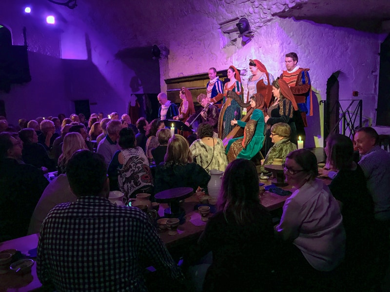 people in costumes at the Bunratty Castle Medieval Banquet