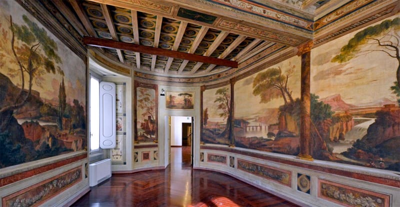 murals on a wall in a museum on the Piazza Navona