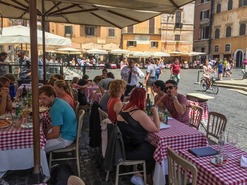 people sitting in an outdoor cafe