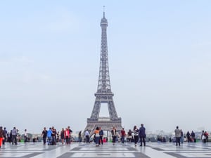 people by the Eiffel Tower in PAris