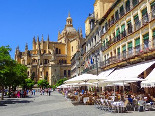 people dining near an old cathedral