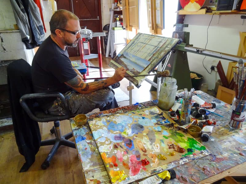 a painter at his easel in Donegal Ireland