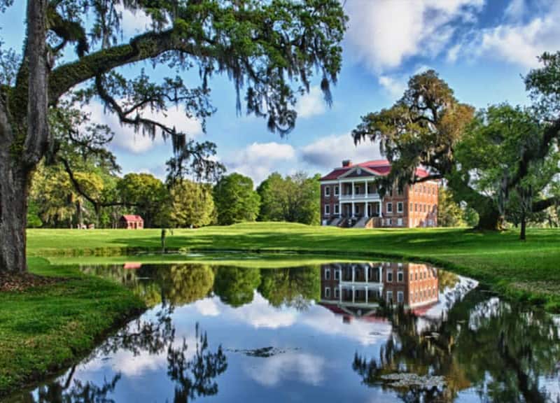 an old house by a pond