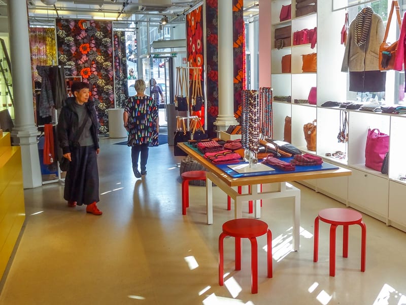Customers in the Marimekko store looking at the colorful display