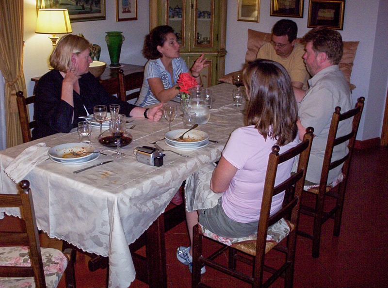 people sitting at a dinner table