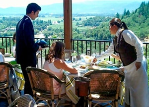 people being served lunch on the balcony overlooking the Napa Valley