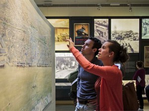 a couple in a museum in one of the European sites for Jewish travelers