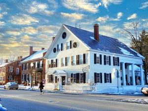 a large white house in a town