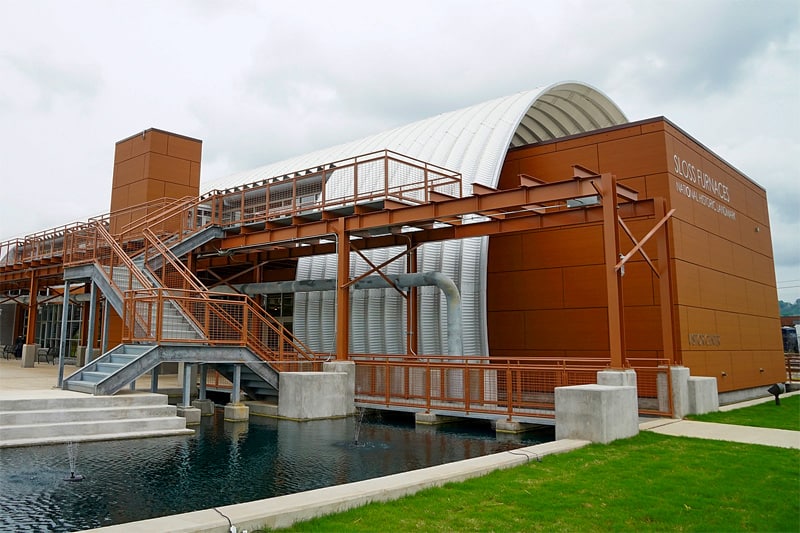 a modern visitor center in an old factory