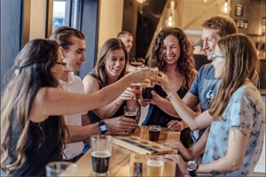 a group of young people drinking beer in Fredericton New Brunswick