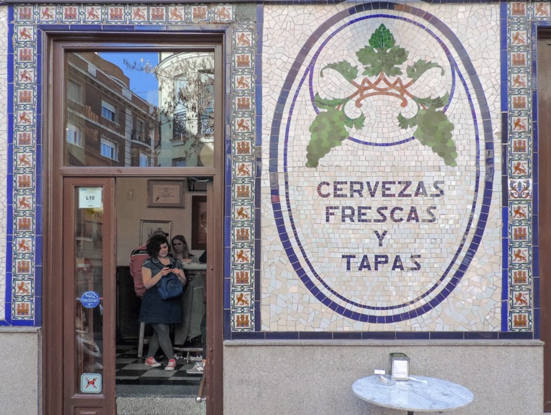 the doorway of a tapas bar