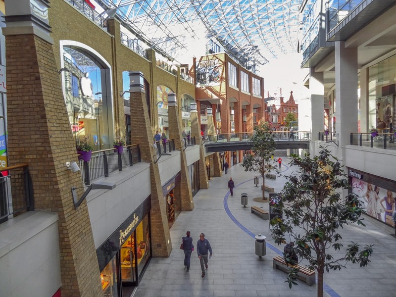 people visiting shops in Victoria Square, one of the best things to do in Belfast.