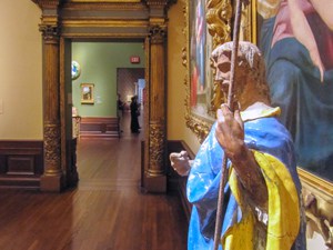a religious statue with blue and yellow clothing in the Ringling Museum