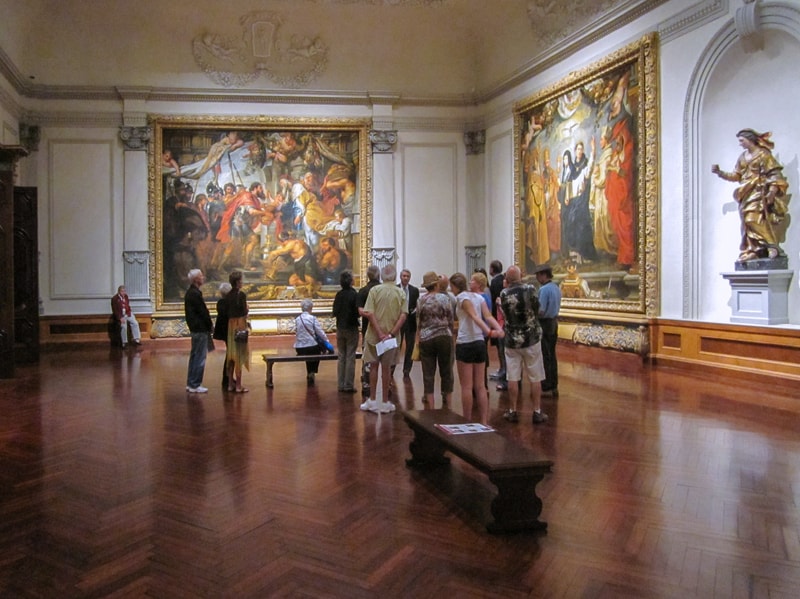 group of people in an art gallery in the Ringling Museum