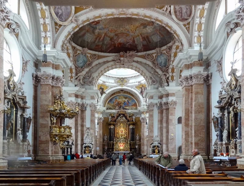 people visiting a beautiful cathedral - one of the things to do in Innsbruck