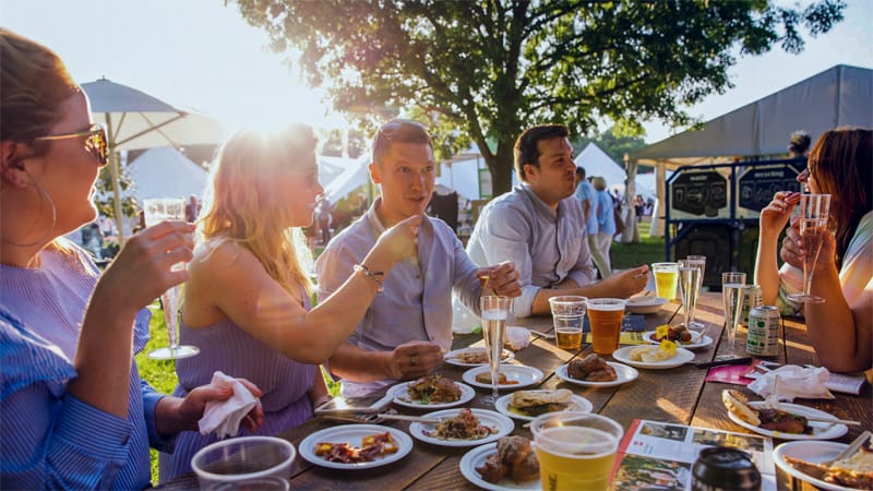 people sitting at a table having drinks