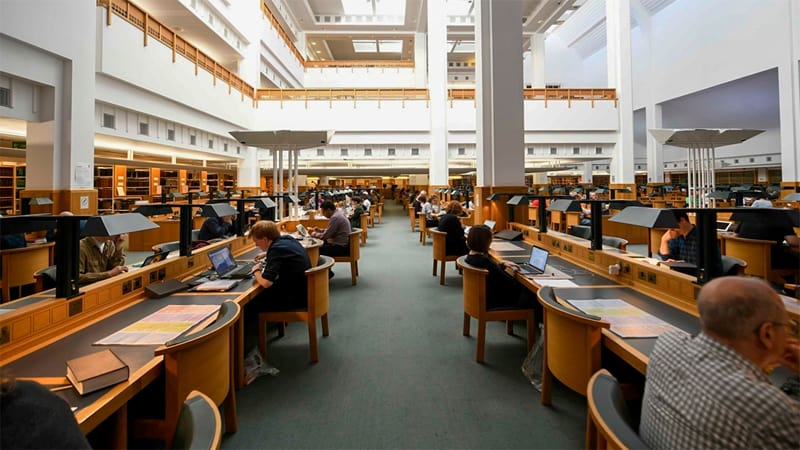 people in a large library room