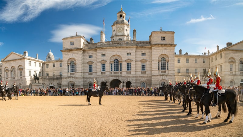 people watching the horse gaurds parade - one of the free things to do in London