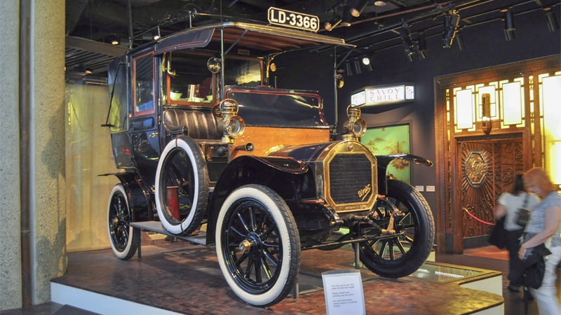 an old car in a museum