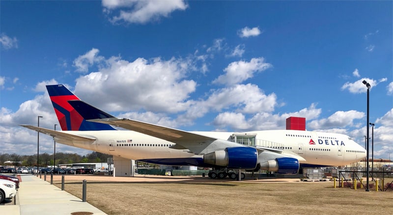 a Delta Airlines 747 in an unusual museum