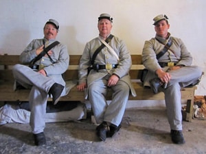 Solders dressed as Confederates during Civil war reenactments