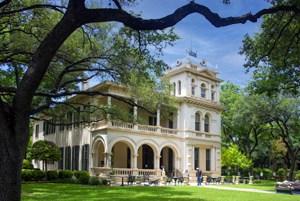 a large house set on a big lawn