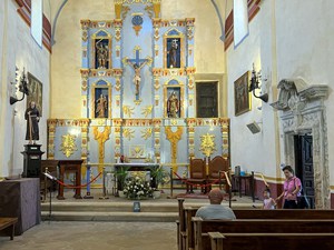 people visiting a mission church - one of the things to do in San Antonio