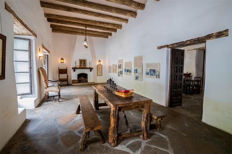 a room with old wooden furniture