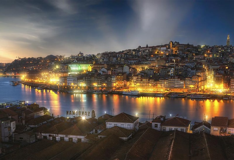 the city of Porto at night, one of the best places to visit in Portugal