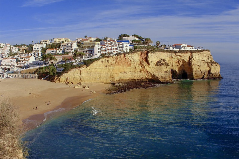 white house on a cliff in the Algarve, one of the best places to visit in Portugal