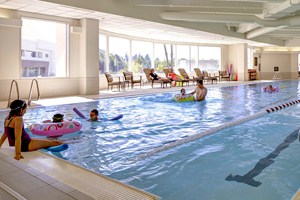 people in a hotel swimming pool