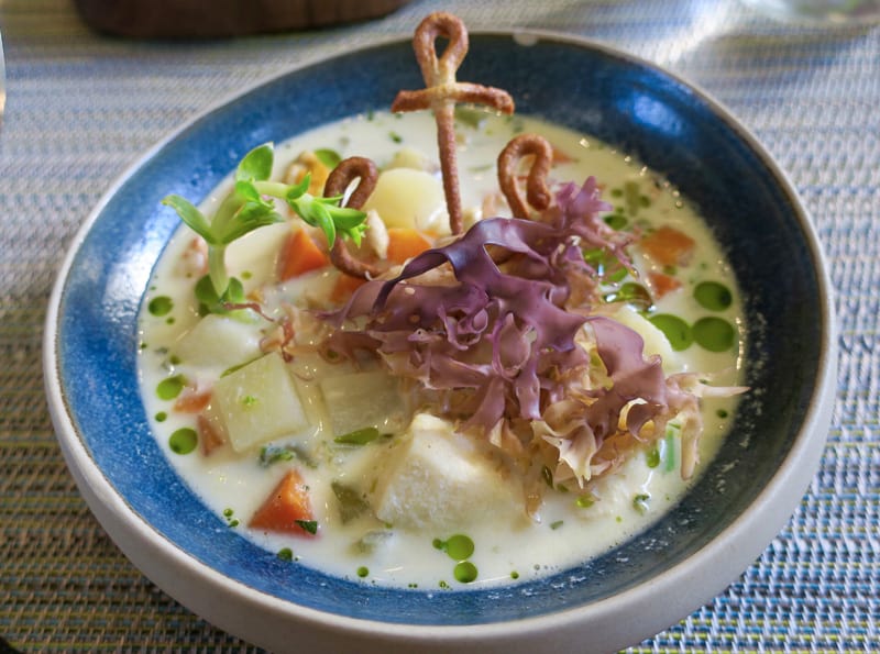 a colorful bowl of east coast chowder at one of the best restaurants in pei / prince edward island