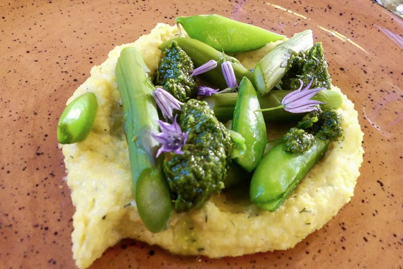 colorful greens in a small bowl made of dough