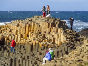 people standing on the Giant's Causeway - seen on a black taxi tour of Belfast