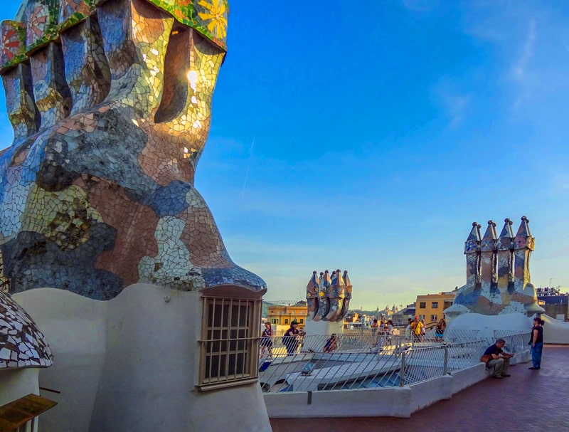 fanciful art work on the roof and chimneys of a building