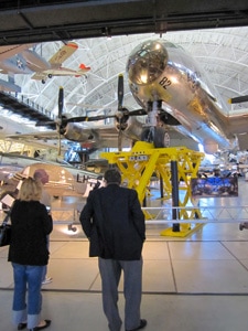 People looking at the World War II bomber Enola Gay